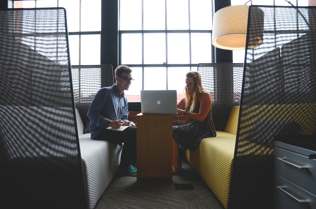 colleagues give critical feedback to each other