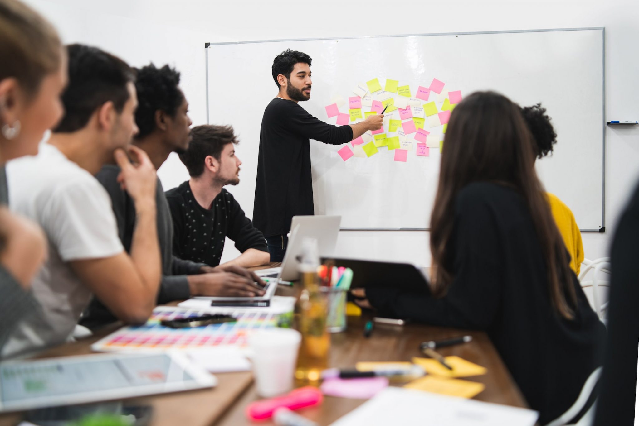 UX professional doing a presentation to students on how to get into UX research.