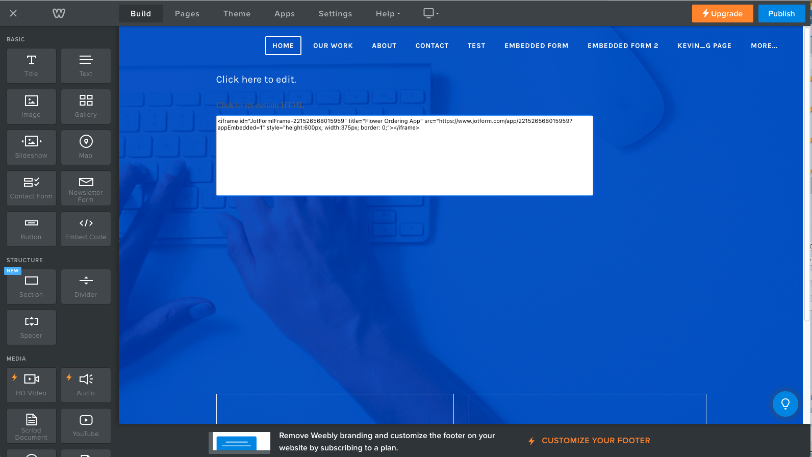 Screenshot of Weebly's site builder with HTML copied into the middle of the site builder