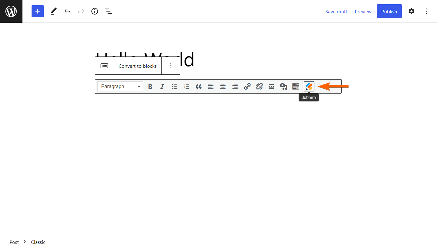 panah menunjukkan ke logo Jotform pada WordPress untuk editor WYSIWYG blok Klasik