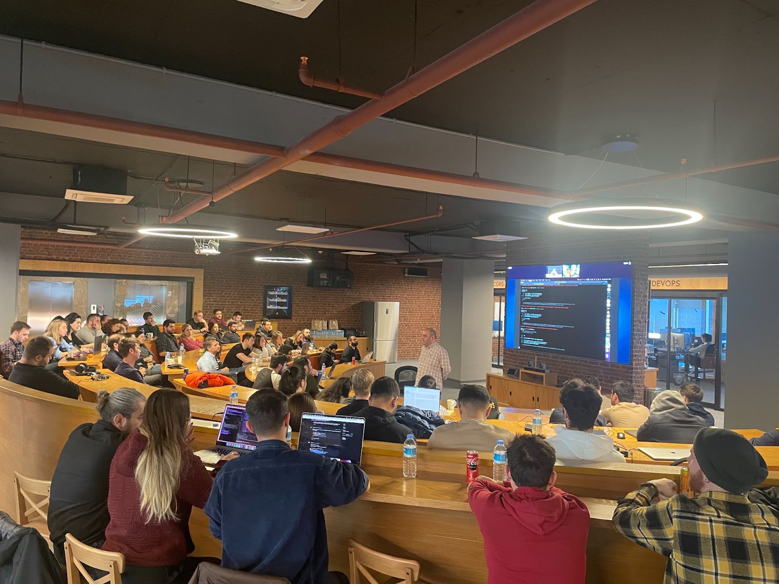 Photograph of Özdemir and Jotform employees on the first day of Accessibility Week
