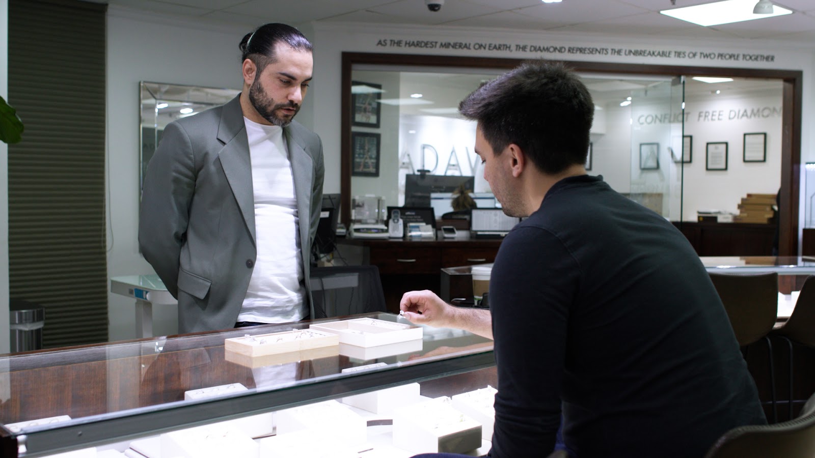 Image of Edan Yachdav with a customer