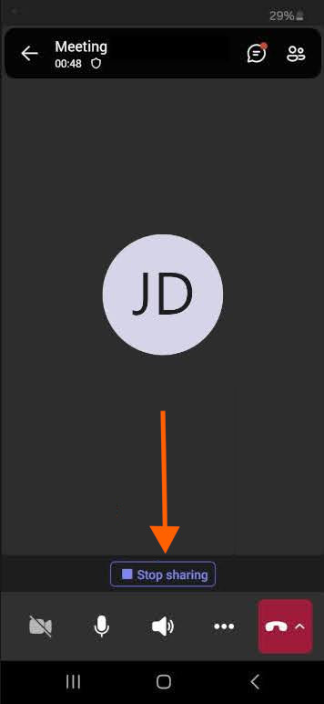 Screenshot on Android of an orange arrow pointing to "Stop sharing" in the middle bottom