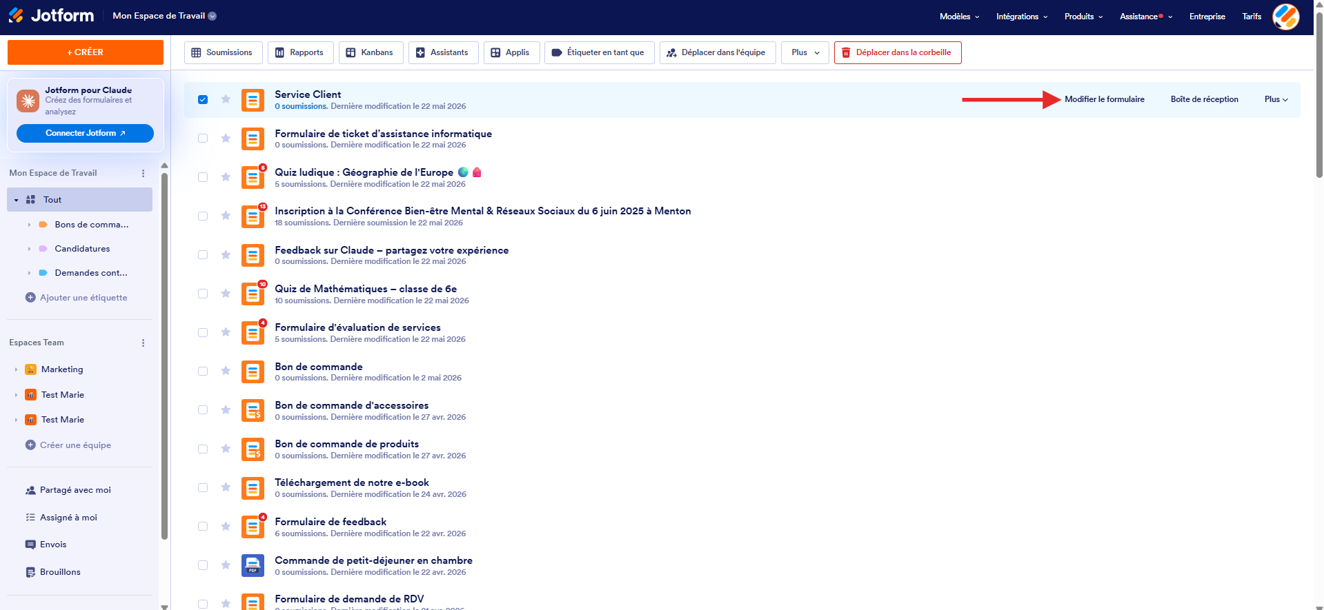 Capture d'écran de la page Mon Espace de Travail Jotform avec un formulaire sélectionné et une flèche pointant vers Modifier le formulaire à droite