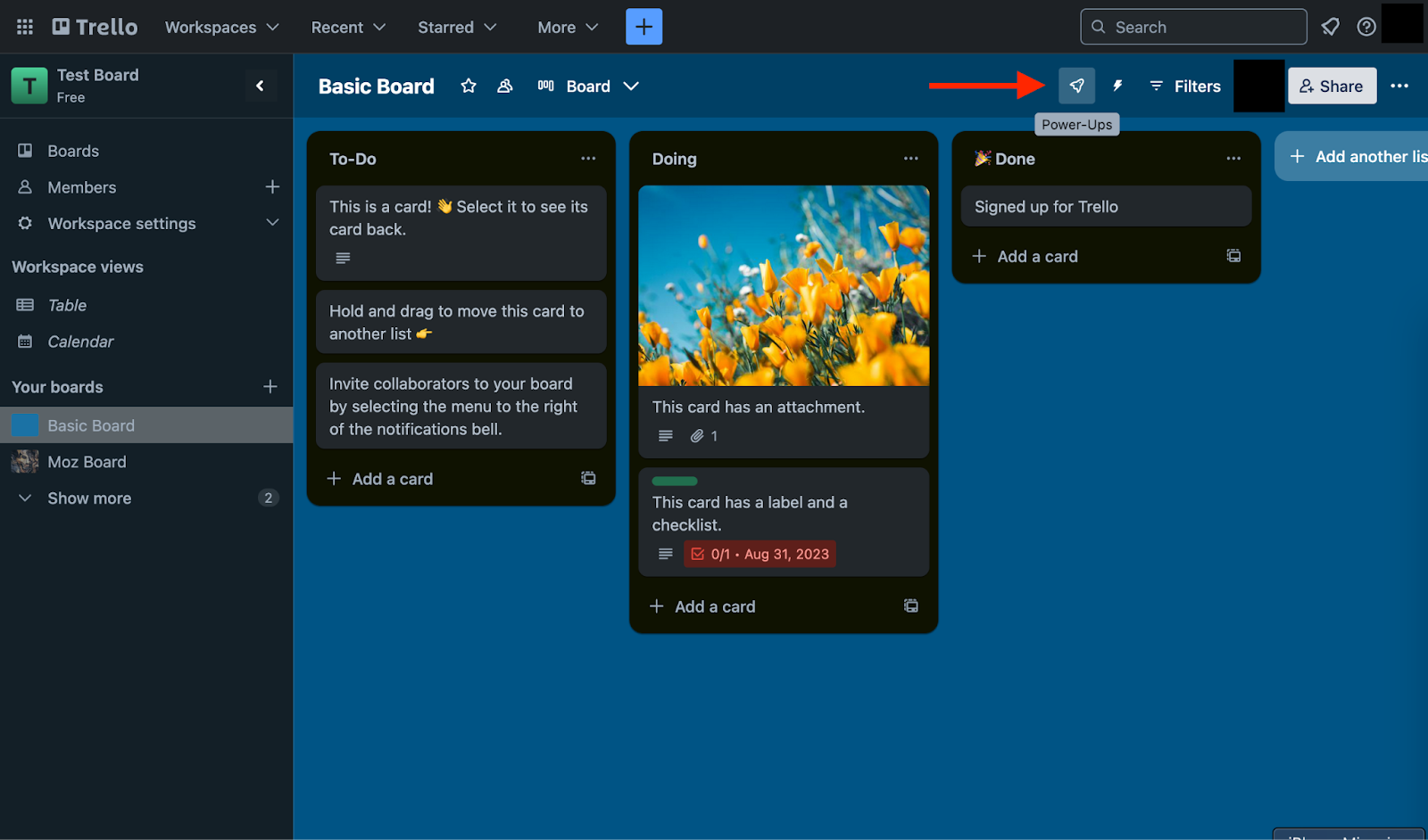 Trello interface showing the example "Basic Board" and an arrow pointing to the "Power-Ups" button indicated by a rocket icon