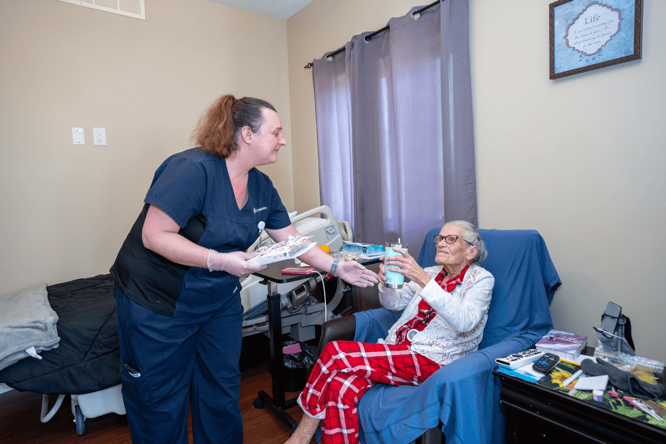Woman helping an elder woman in the case center